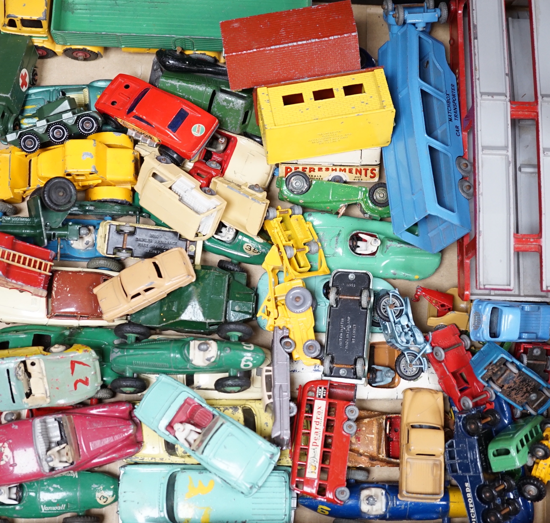 A collection of Dinky Toys, Matchbox Series diecast vehicles, including Dinky Auto Service Car Carrier and trailer, Leyland Octopus, MG Midget, Aston Martin, etc. (approx 80+)